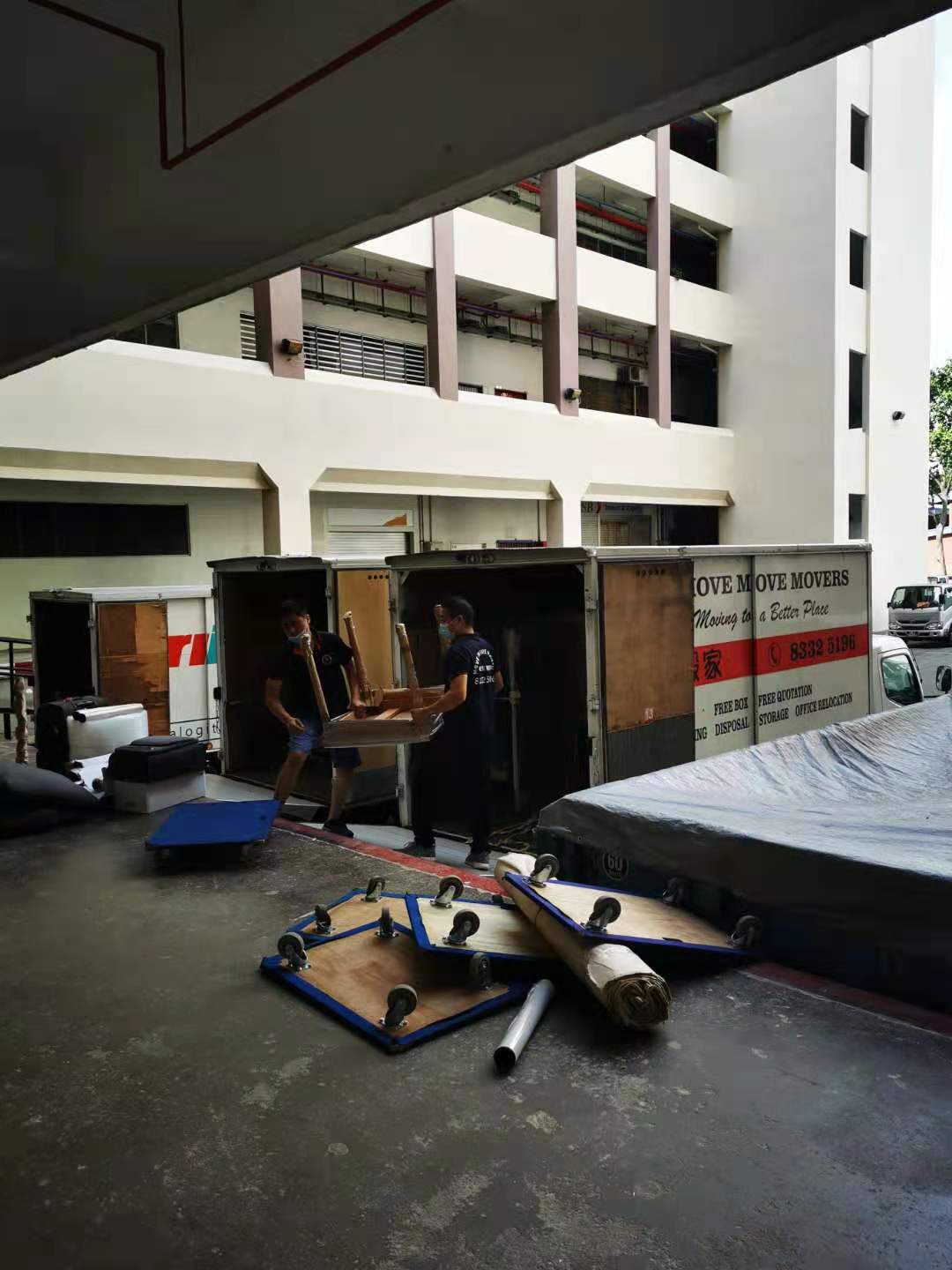 Science park office relocation tailgate loading - move move movers – move move movers – move move movers Move Move Movers crew loading office furniture into a branded truck during an office relocation at Science Park