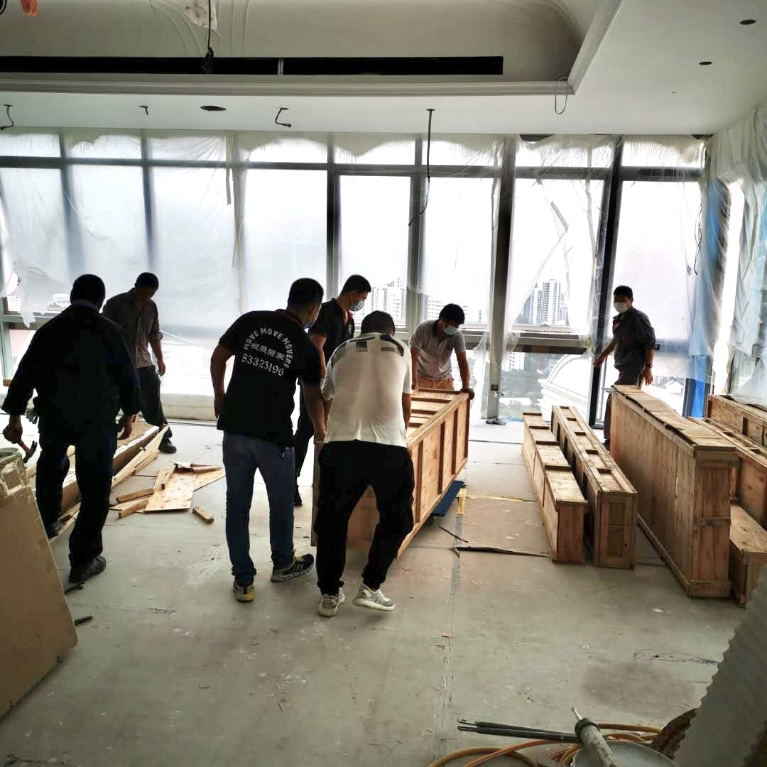 Crated commercial goods handling - move move movers – move move movers – move move movers Move Move Movers crew handling crated commercial goods during a last-mile business delivery