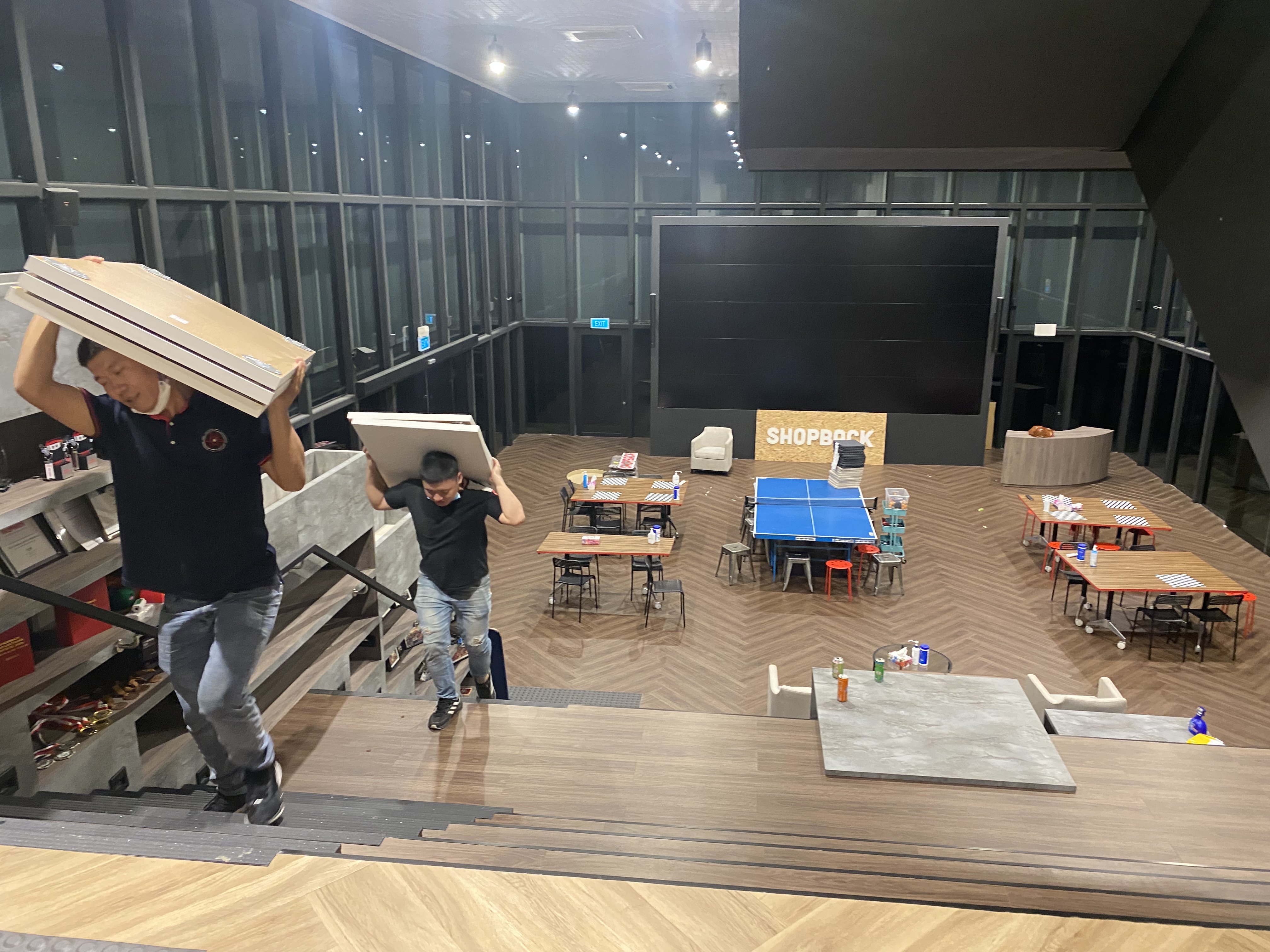 Commercial office relocation in Singapore with boxed workstations and site preparation