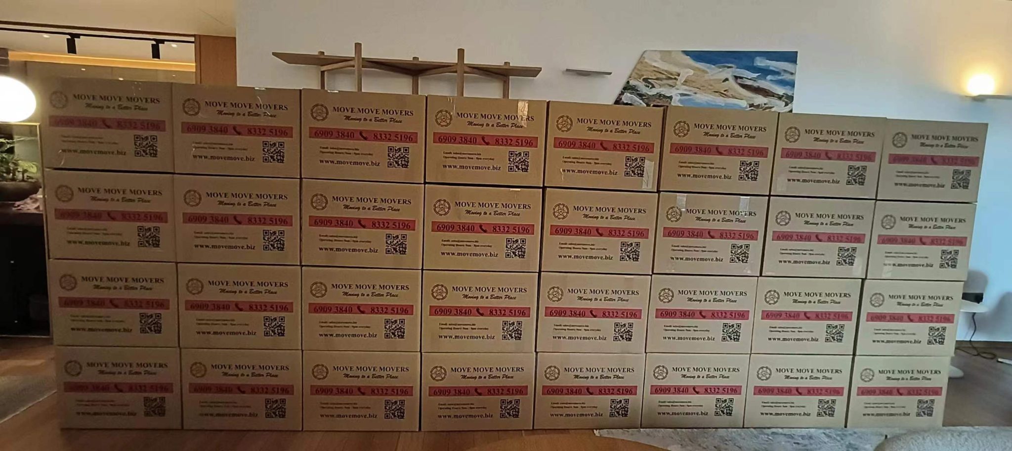Packed moving boxes prepared for a Singapore house move with clear labeling and staging