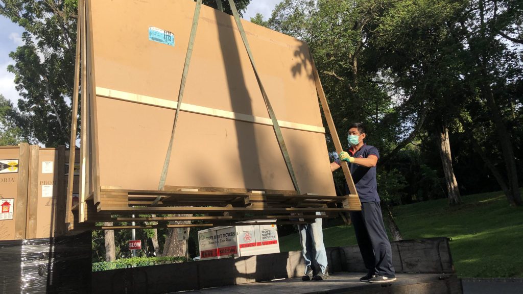 Move Move Movers branded lorry and moving crew during a Singapore moving job